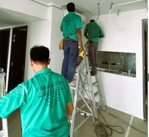 Paramount installation team carrying out ceiling works in a home